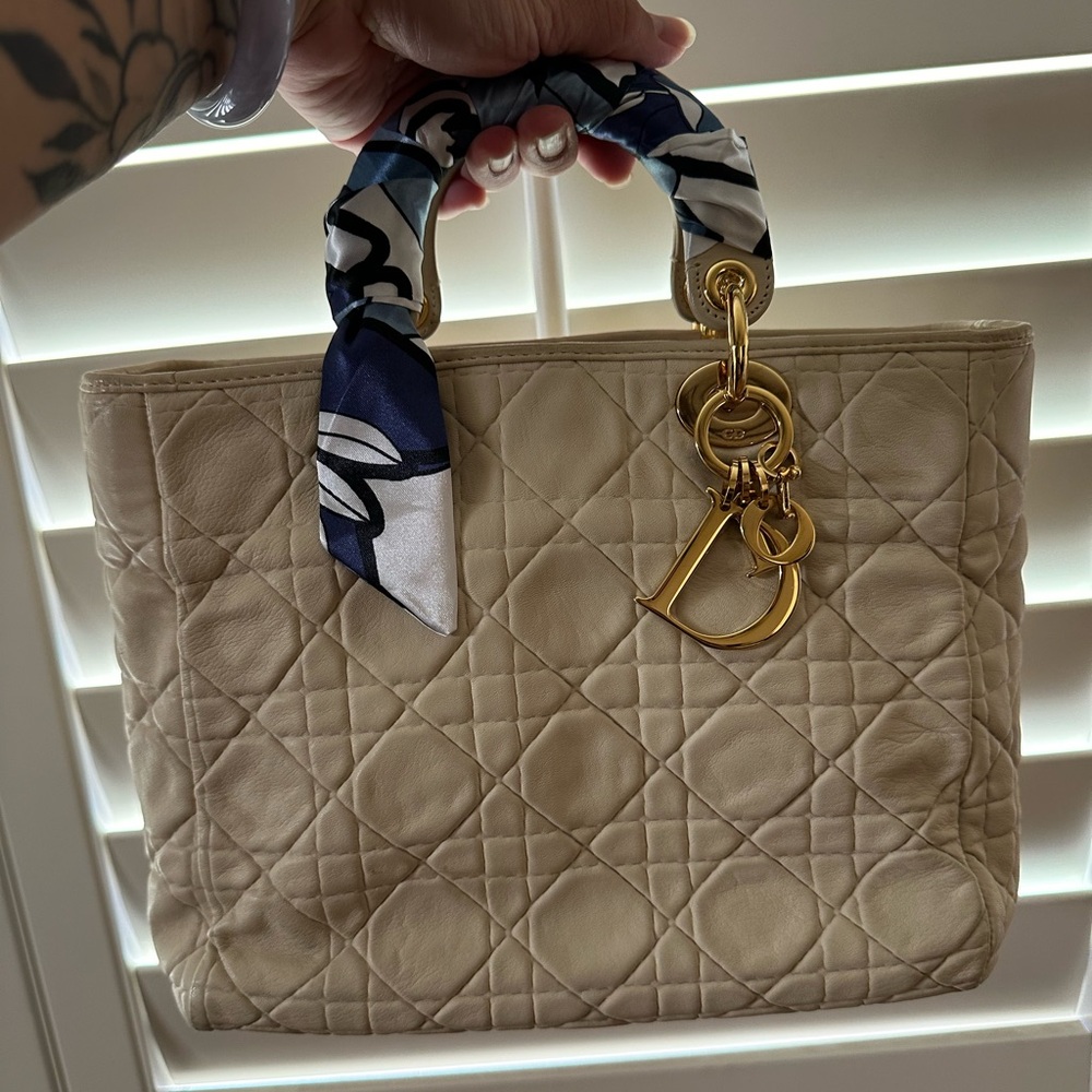 Preloved medium lady Dior soft leather in cream color.
